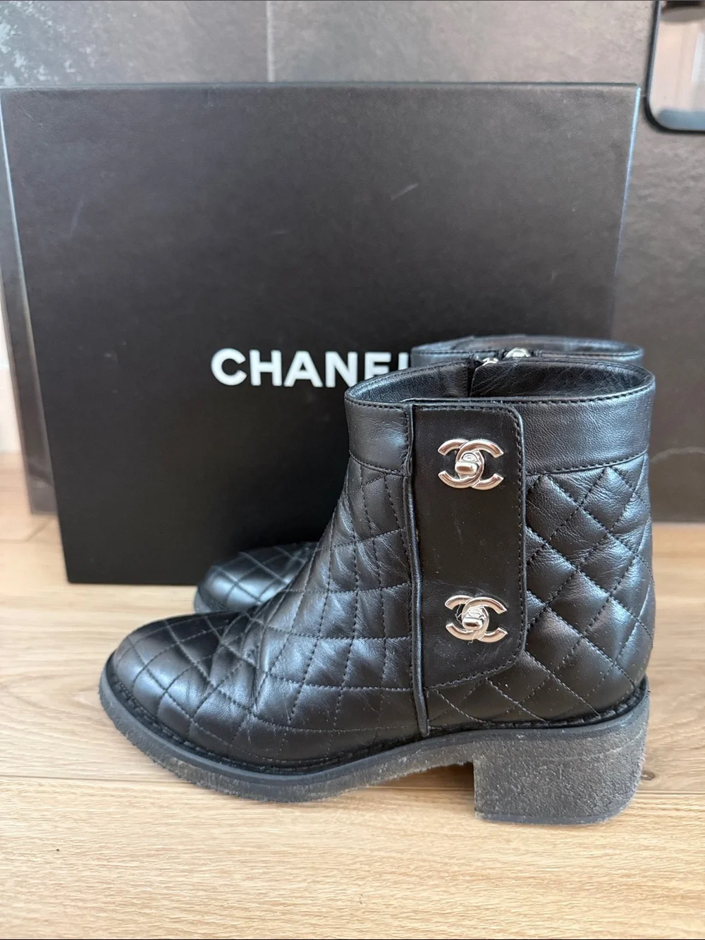 CHANEL Black Quilted Lambskin Ankle Boots with Silver CC Emblems